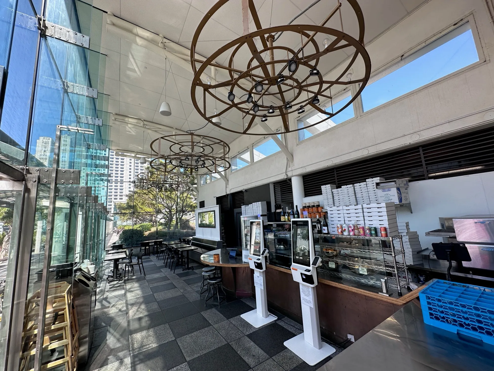 Dining room with circular light fixtures at the Yerba Buena flagship