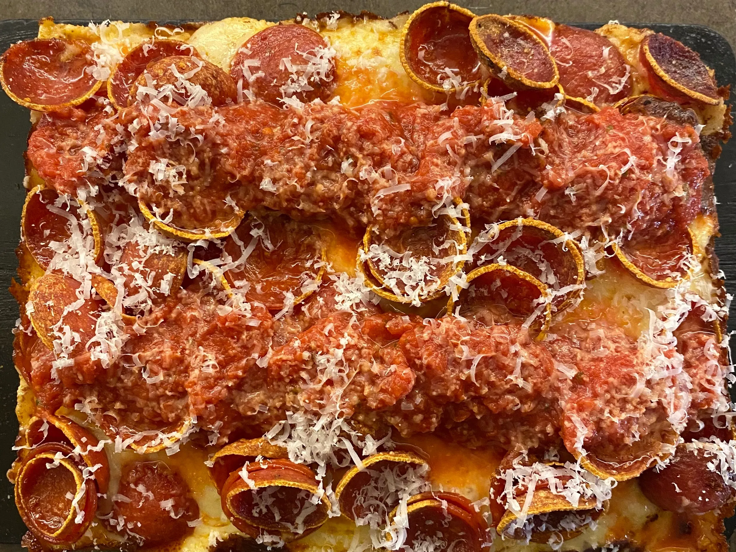 A Joyride Detroit-style square pizza piled with crispy cup-and-char pepperoni.